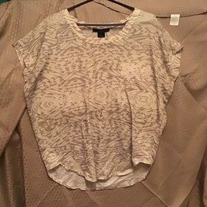 Tan and white print blouse